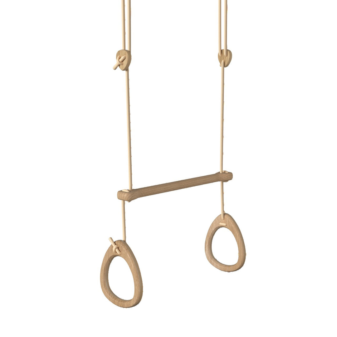 Oak gymnastic rings hanging on a bar with beige ropes against a white background