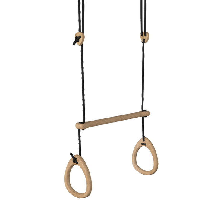 Wooden gymnastic rings with a bar on black ropes against a white background