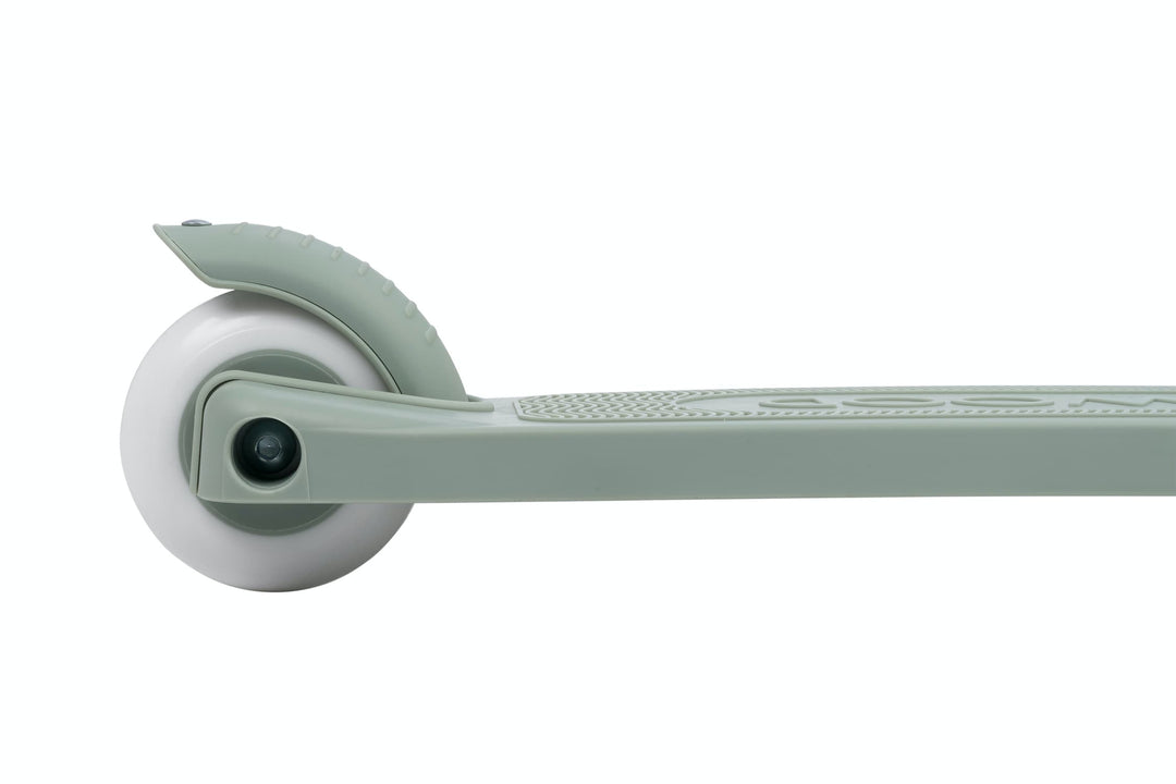 Close-up of a scooter back wheel on a white background