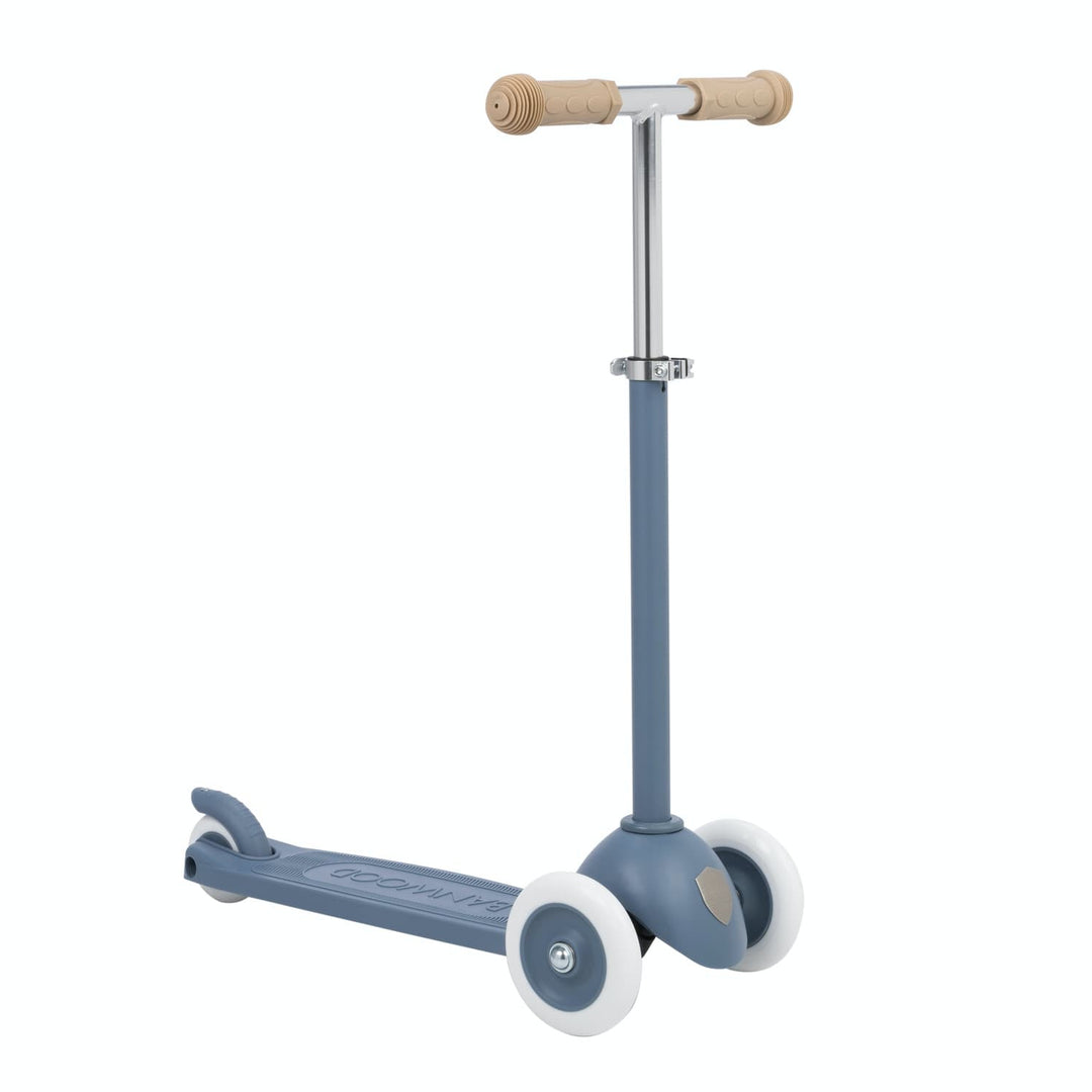 Children's scooter with a blue body and beige rubber grips handlebar on a white background