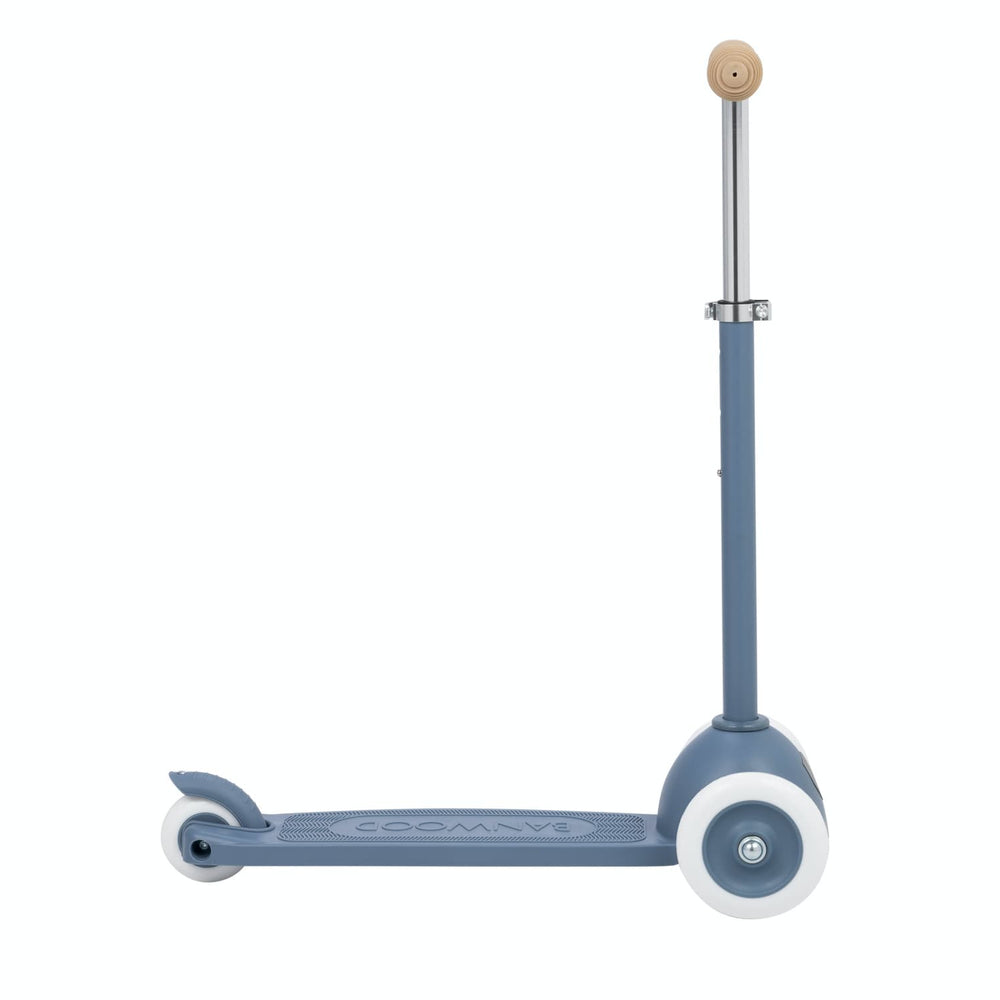 Children's scooter with a blue frame and white wheels on a white background