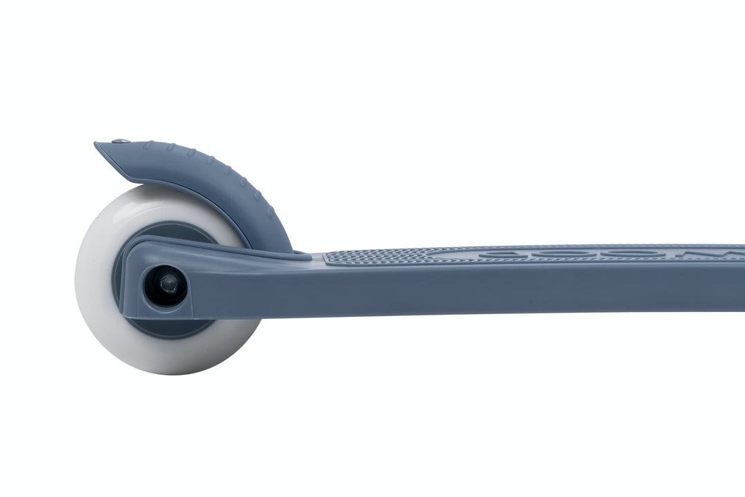 Close-up of a scooter wheel on a white background