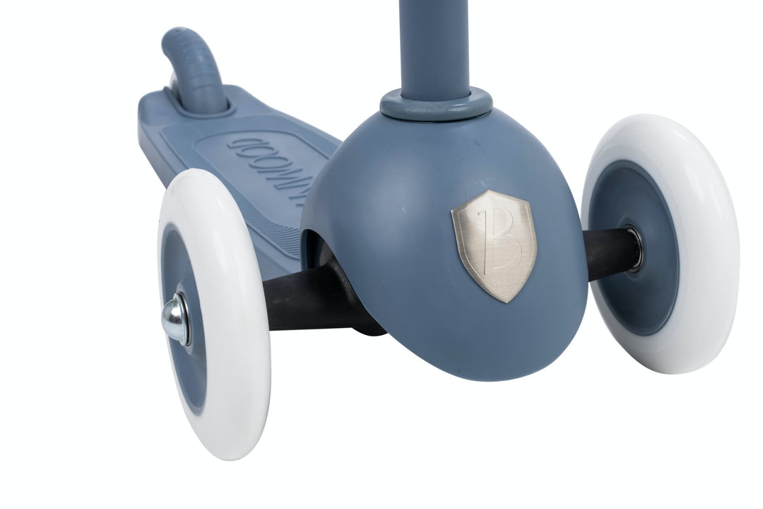 Close-up of a blue scooter with white wheels on a white background