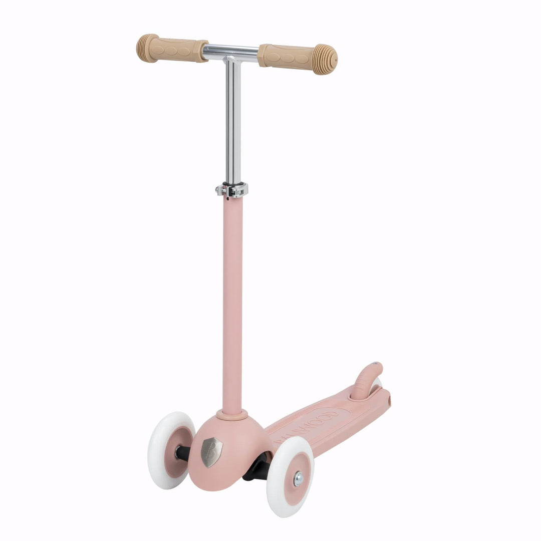 Dusty rose scooter with handlebar on a white background
