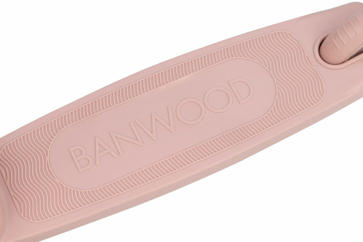 Dusty rose scooter deck with 'Banwood' branding on a white background