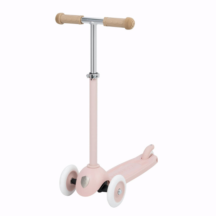 Pink children's scooter with rubber grip  handlebar on a white background
