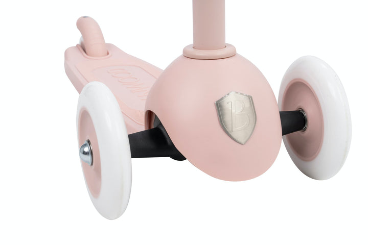 Pink children's scooter with white wheels on a white background