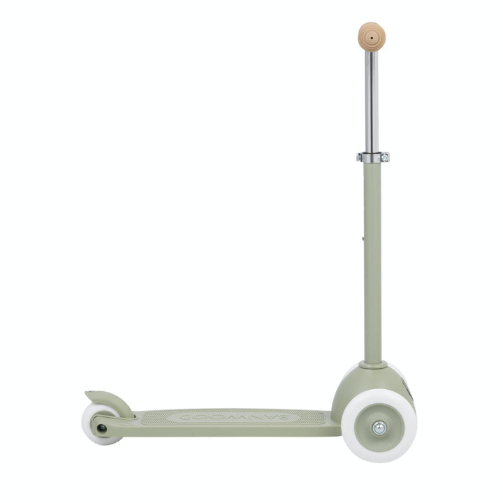 Side view of a Banwood olive scooter on a white background
