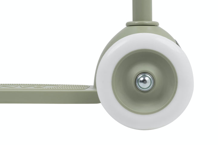Close-up of a n olive scooter wheel with white rim on a white background