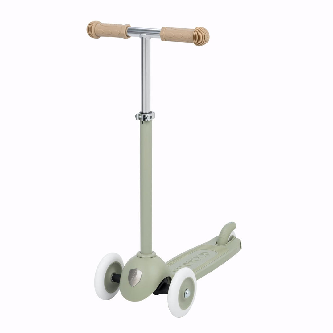 Children's scooter with a olive green body and handlebar on a white background
