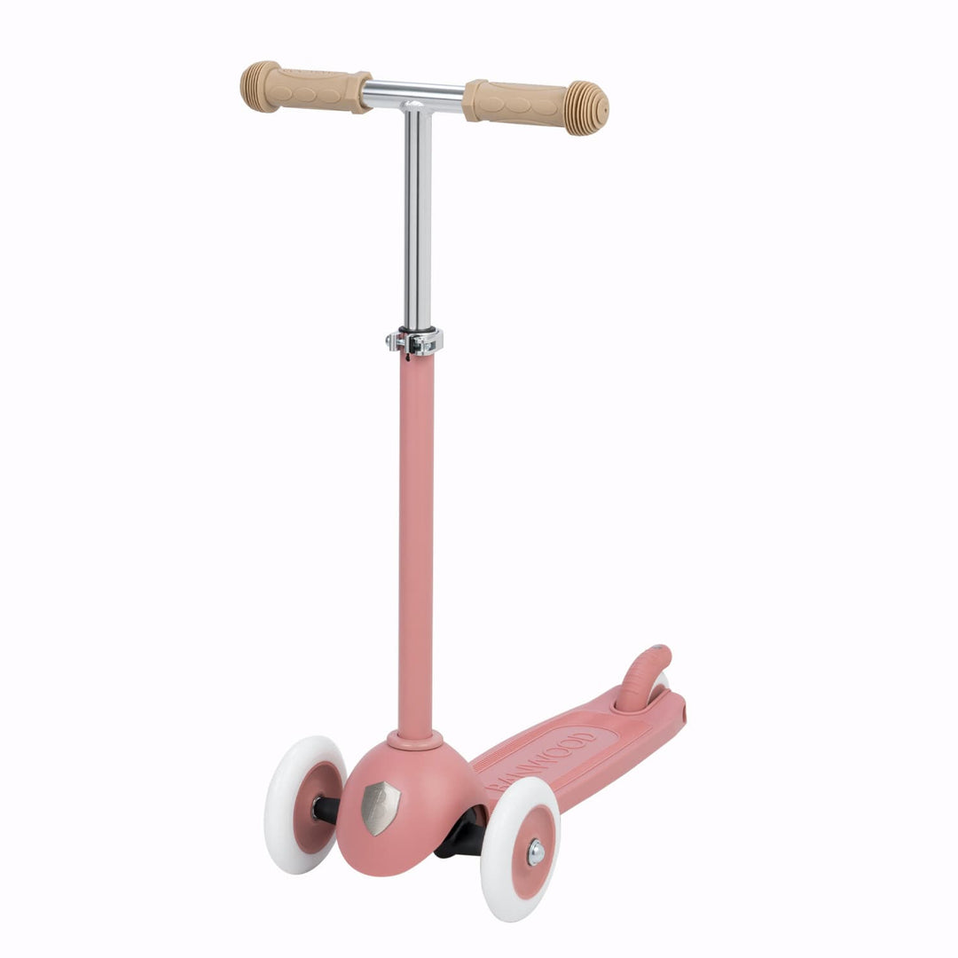 Pink scooter with on a white background