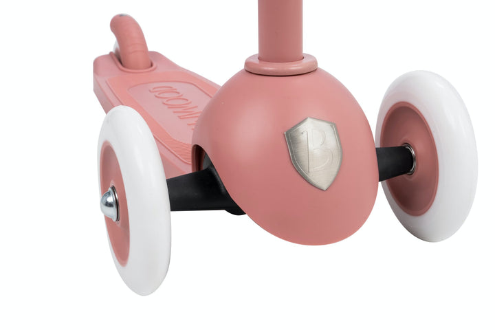 Pink scooter with white wheels on a white background