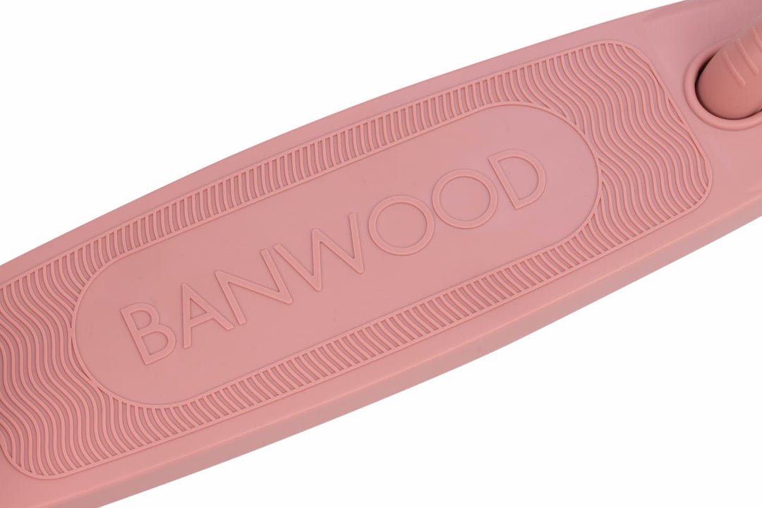 Pink scooter deck with 'Banwood' branding on a white background