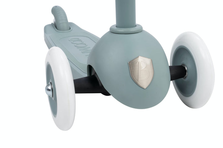 Children's scooter with teal body and white wheels on a white background