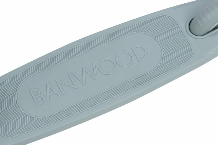 Close-up of a teal scooter deck with 'Banwood' branding on a white background
