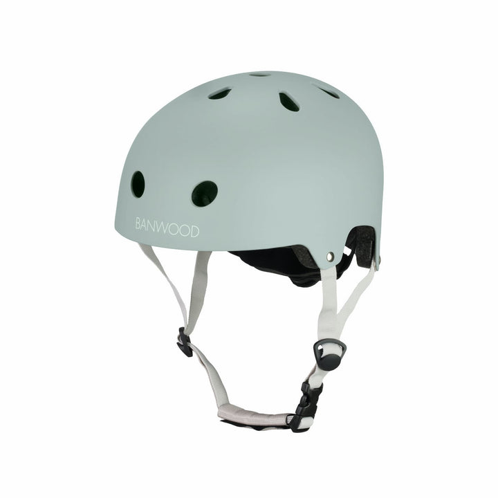Light green banwood helmet with white straps on a white background