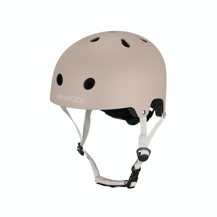 Sand coloured Banwood helmet with white straps on a white background
