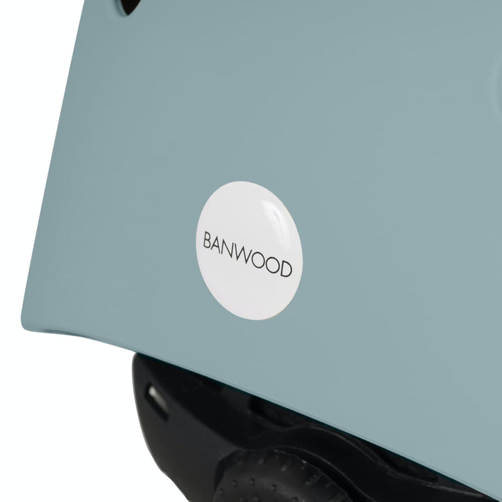 Teal helmet with a white 'BANWOOD' label on a white background