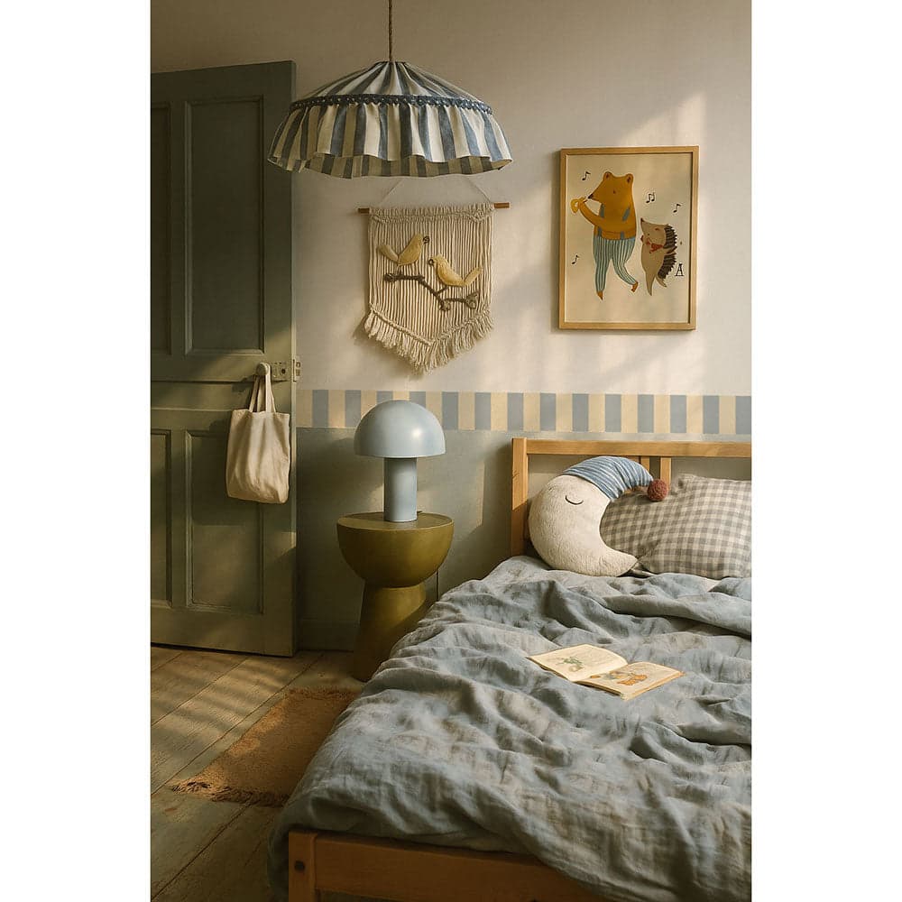 Children's bedroom with a bed, lamp, and wall decorations.