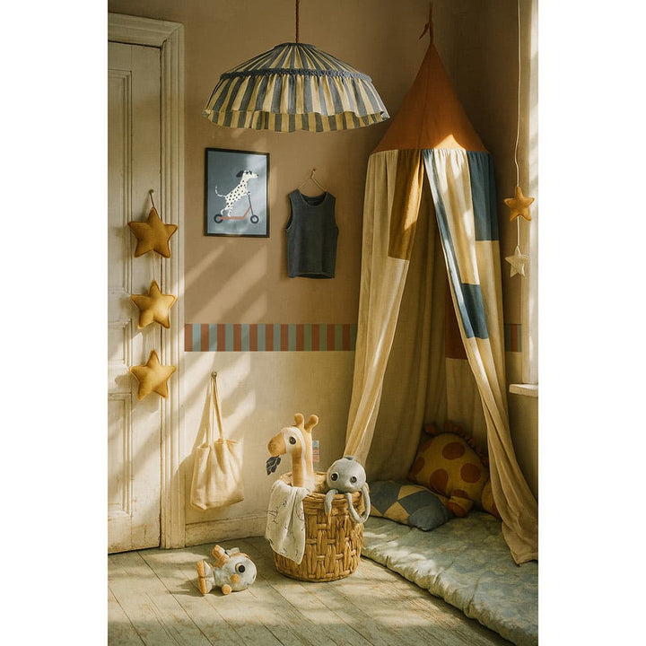 Children's room with a teepee, toys, and decorative elements.