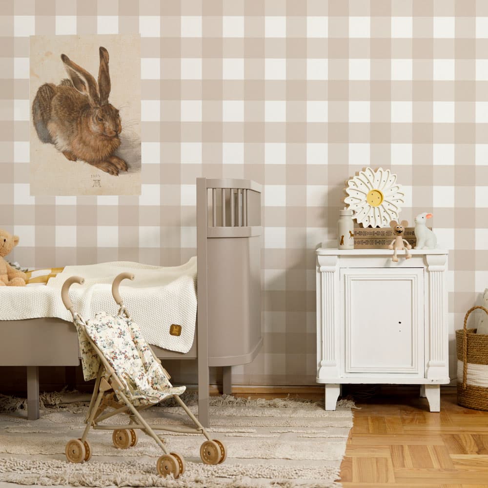 Nursery room with checkered wallpaper, wooden furniture, and decorative items.
