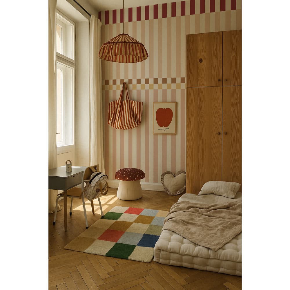 Children's room with striped wallpaper, wooden floor, and colorful rug.