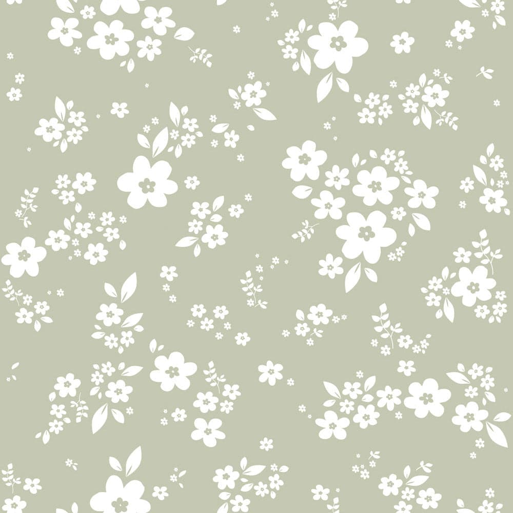 White floral pattern on a light green background