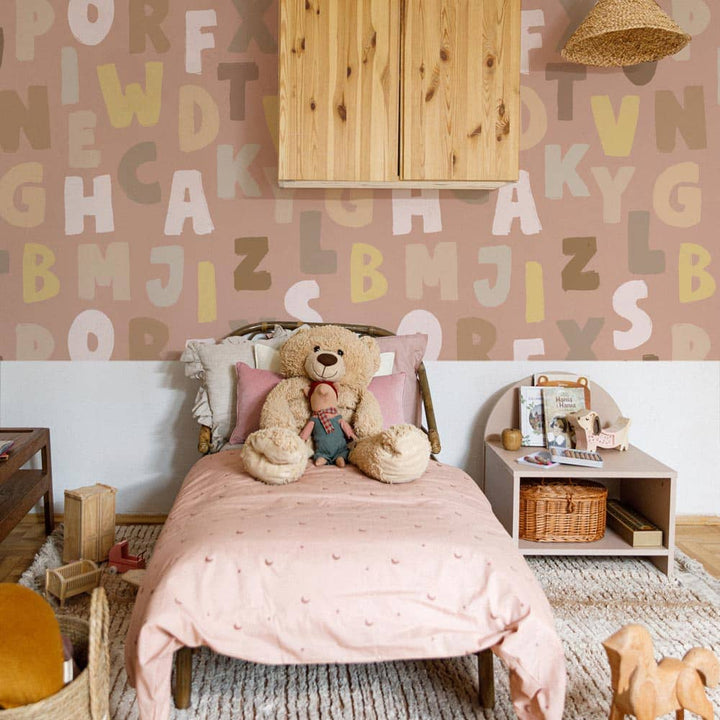Dekornik Letters Pink Wallpaper on bedroom wall behind bed