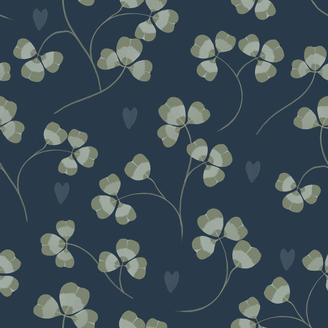 Floral pattern with green clover leaves and scattered hearts on a dark blue background