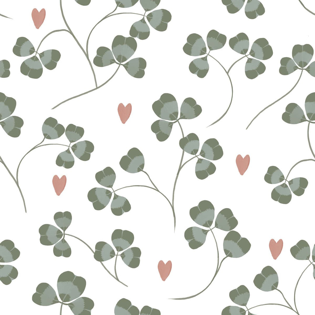 Pattern of green clovers and pink hearts on a white background