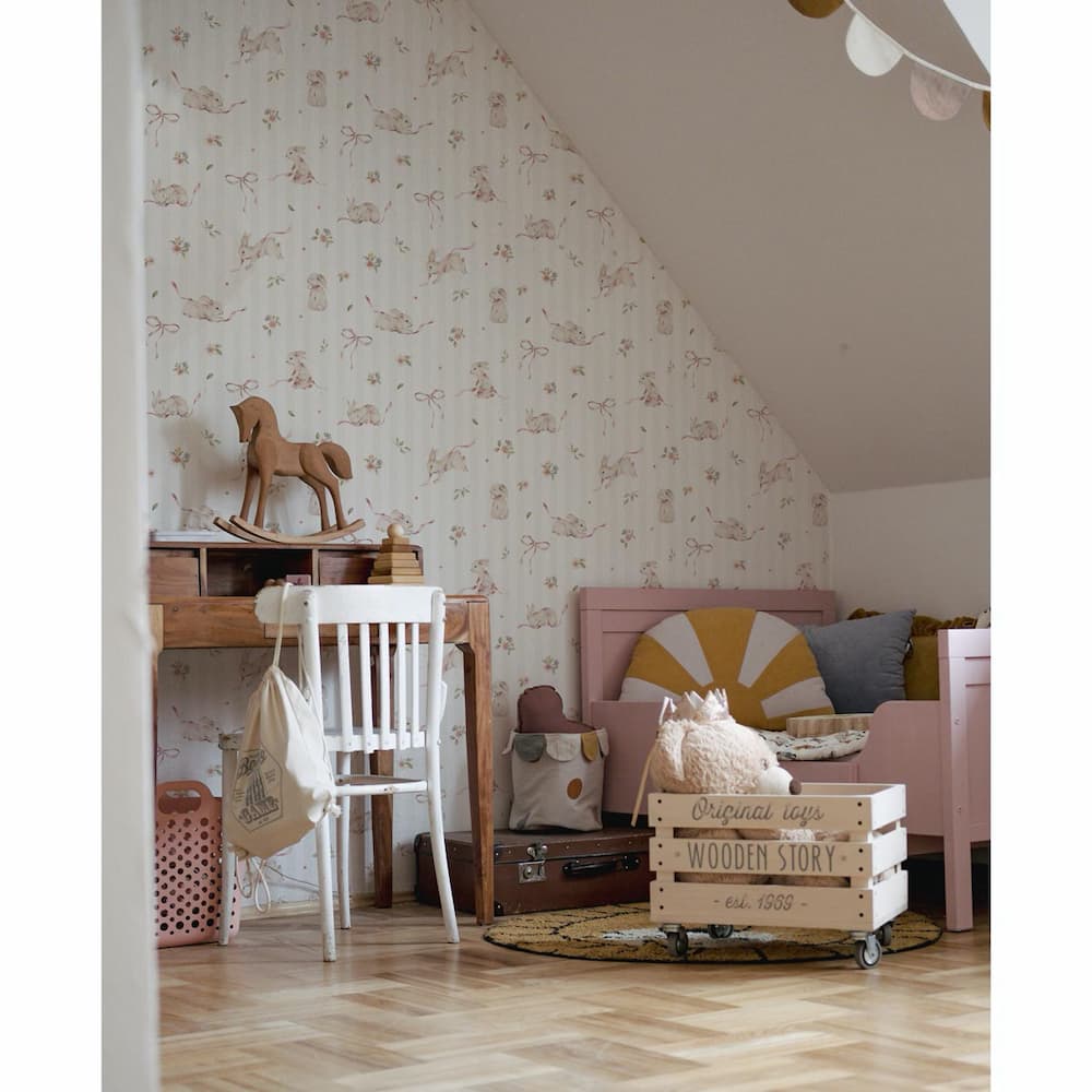 Dekornik Pink Rabbits On Stripes Wallpaper on bedroom wall with pink bed and desk