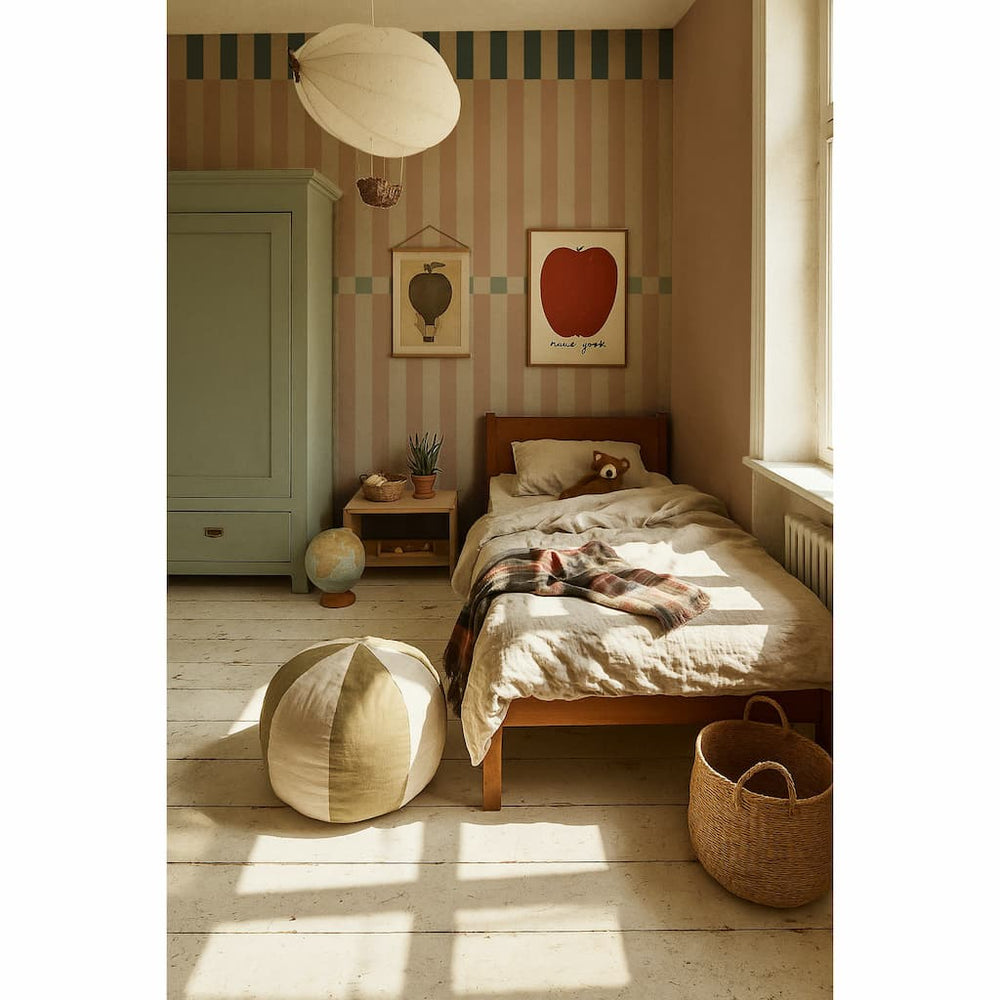 Children's bedroom with a bed, toys, and decorative items.