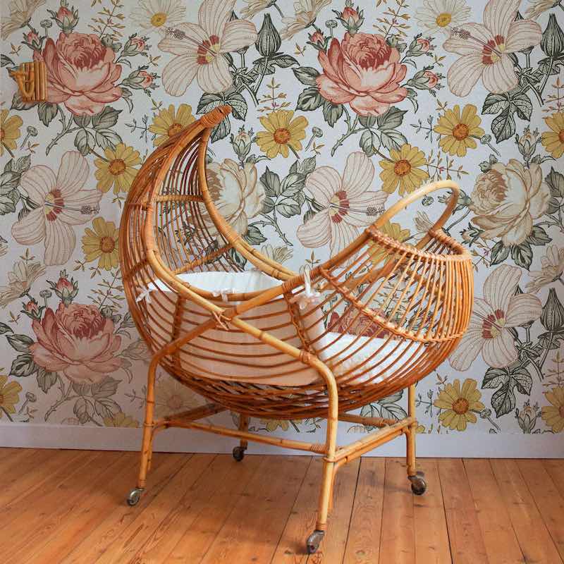 Dekornik Australian Summer Wallpaper on nursery wall with cane crib