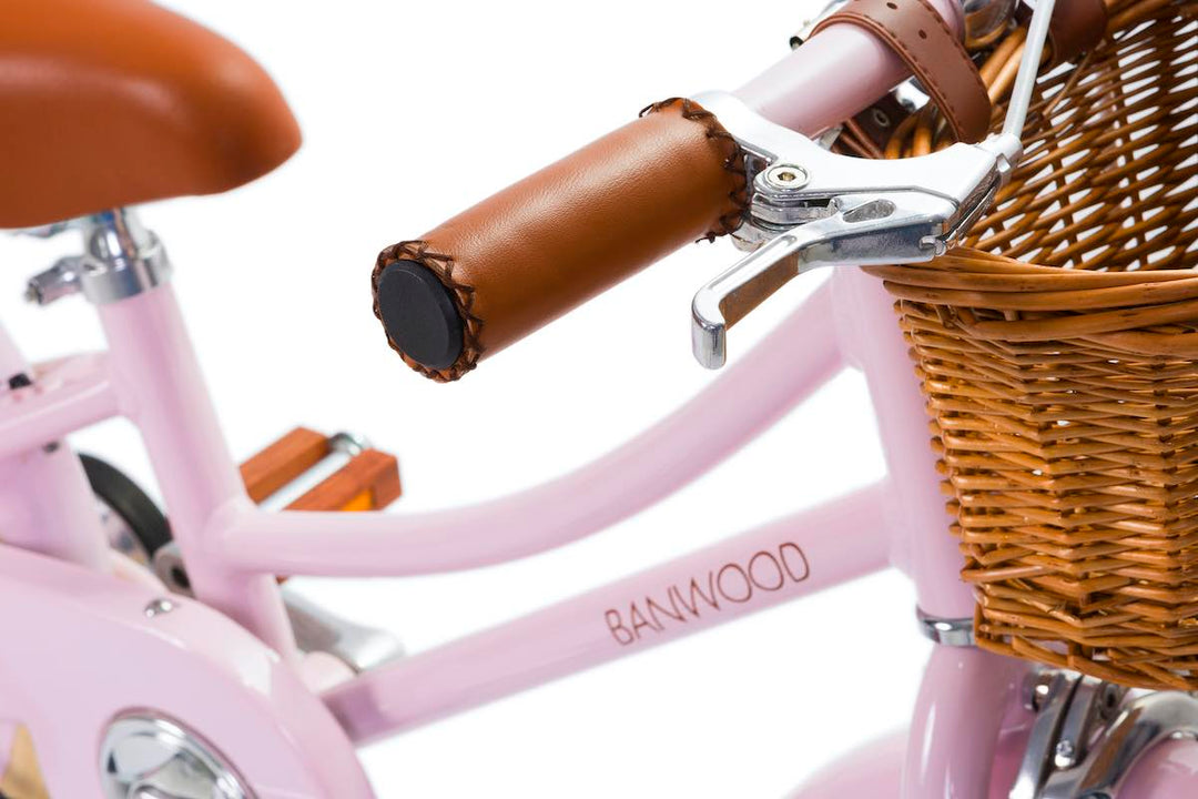 Pink Banwood Classic Bicycle handlebar and seat close up