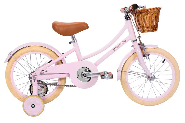 Pink Banwood Classic Bicycle with training wheels and wicker basket