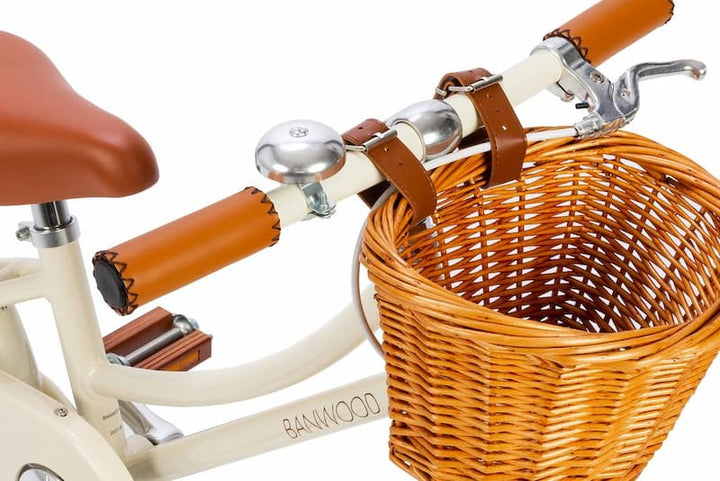 Close up of the Banwood Cream Classic Bicycle basket and handle bars