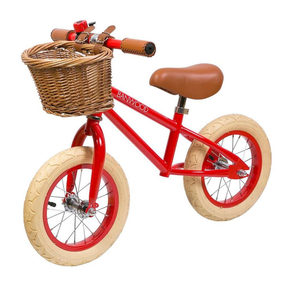 Red Banwood First Go Balance Bike with wicker basket