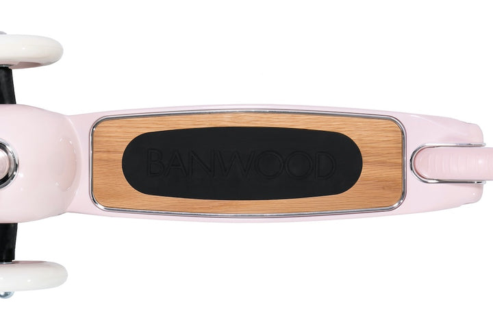 Top view of pink Banwood Scooter oak deck