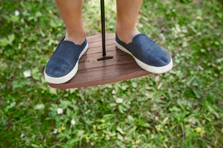 Close up of feet on Lillagunga Disco Swing