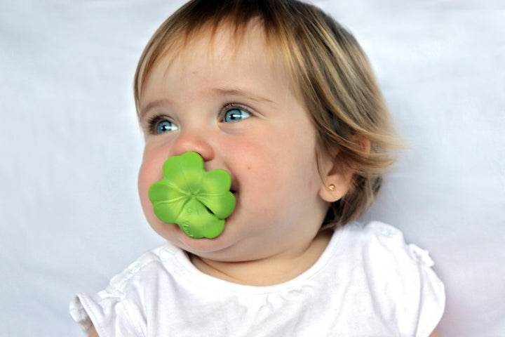 Baby with Oli & Carol Eli The Clover Mini Teething Toy in mouth