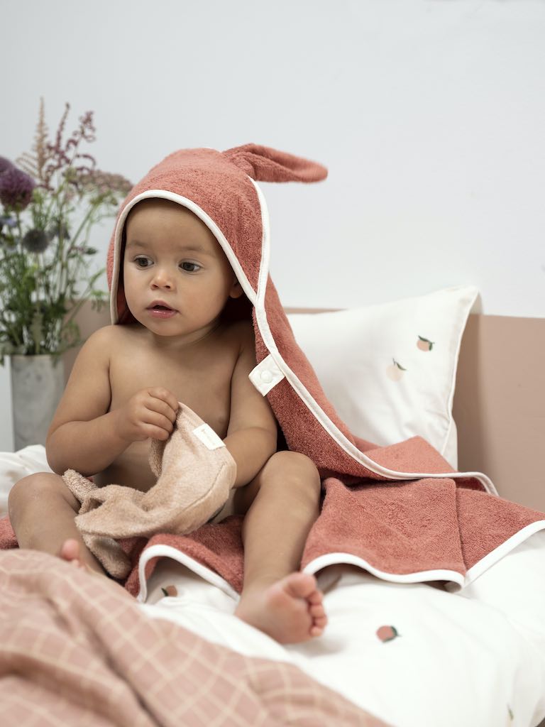 Baby wearing Fabelab Hooded Baby Towel 